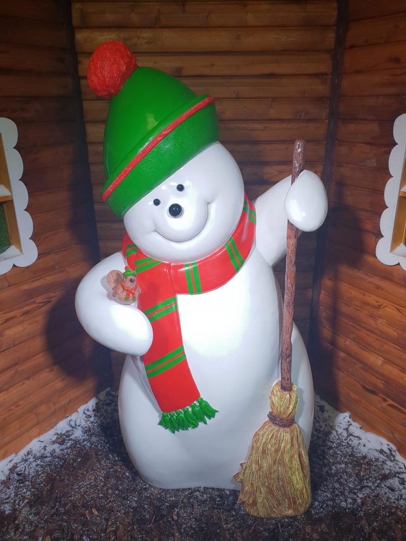 Snowman with broom